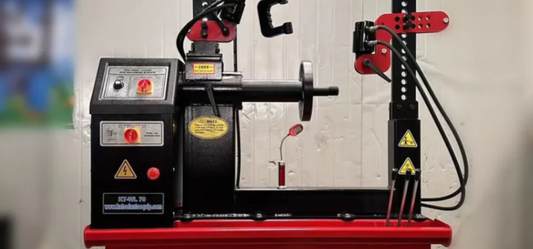 KATOOL WL70 Professional Rim Straightener Machine with hydraulic system, control panel, and precision adjustment mechanisms for automotive wheel repair workshops.